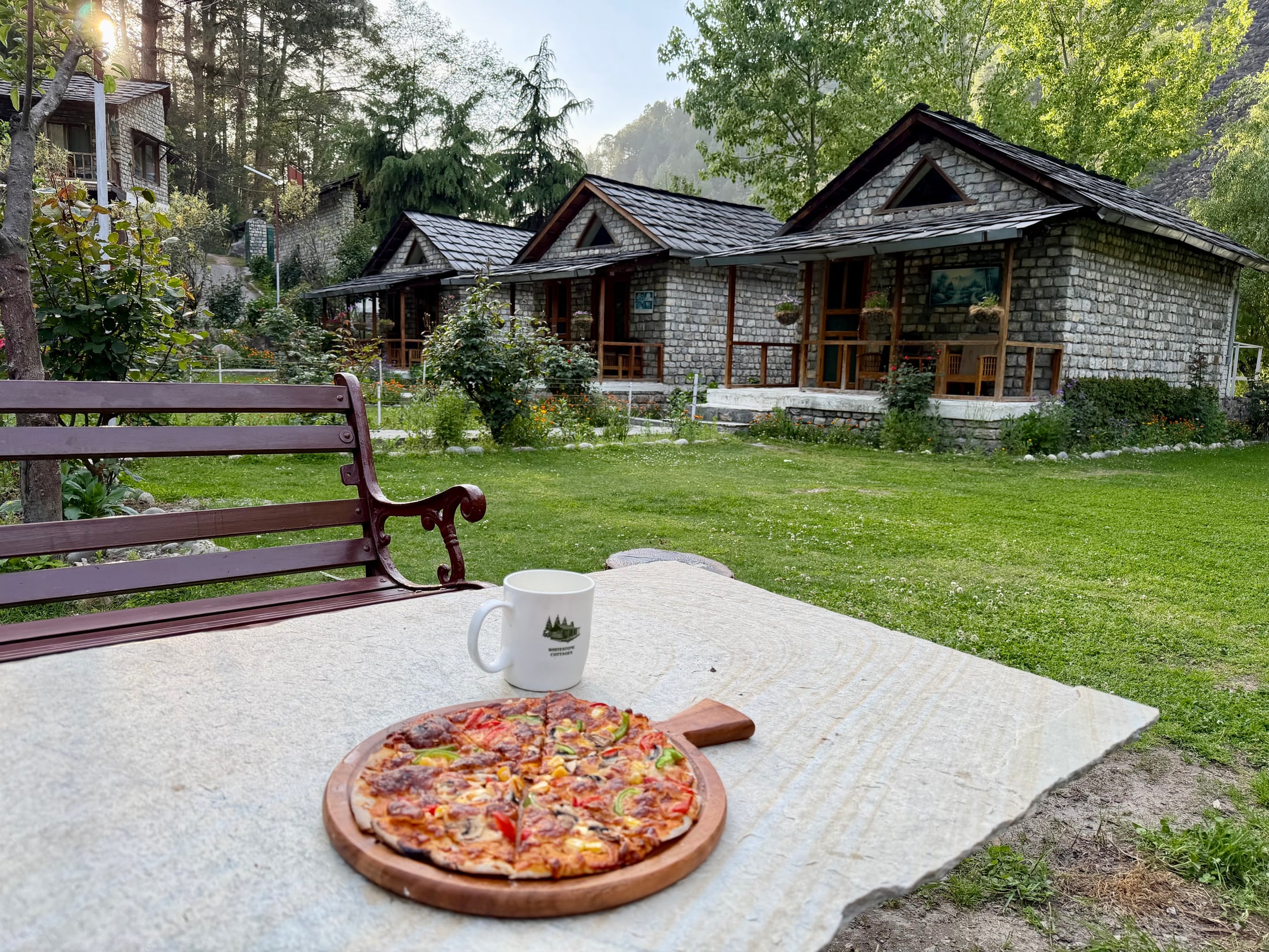 Pizza served in the lawn area at WhiteStone Cottages