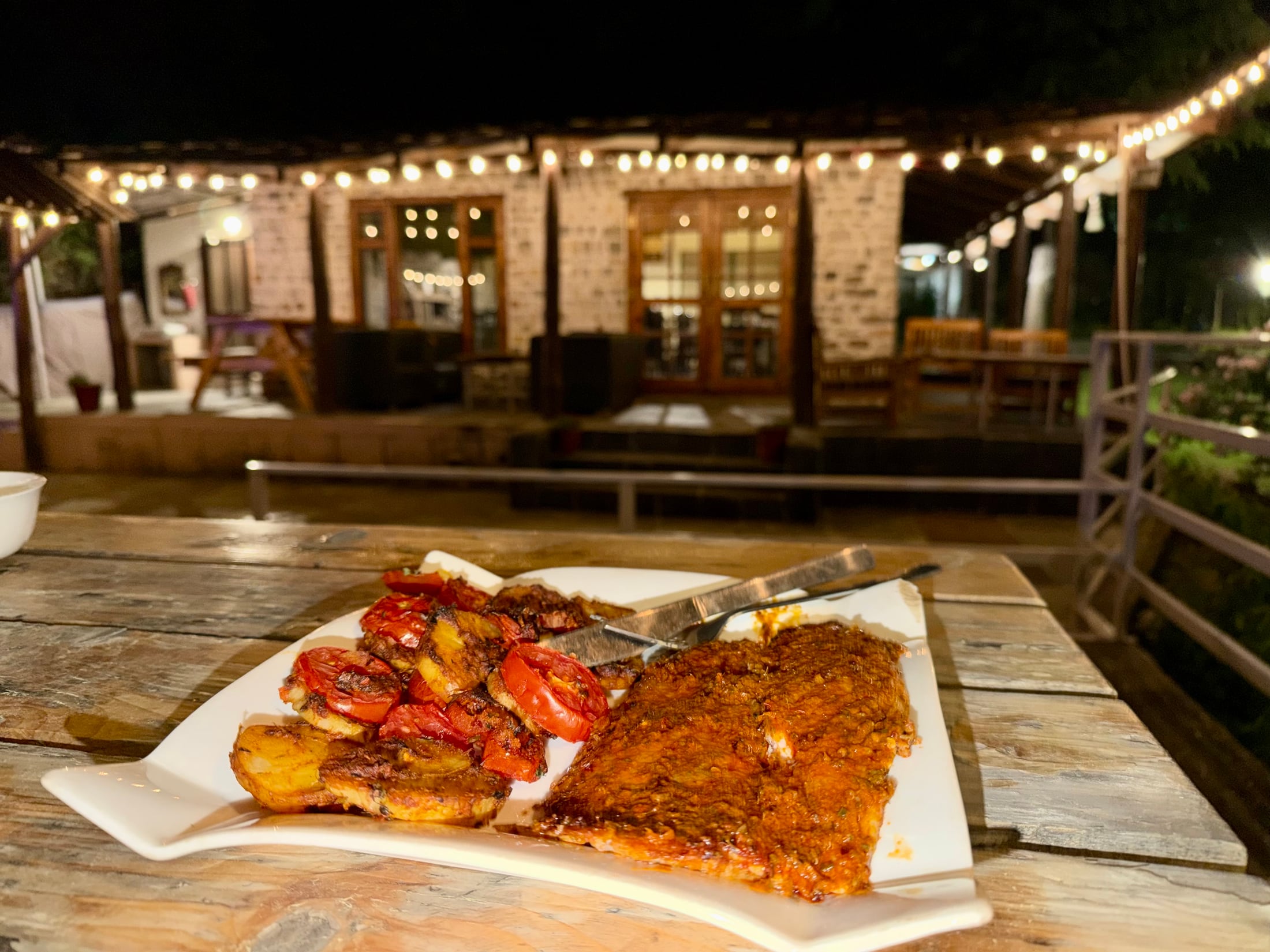 Food served in the riverside dining area at WhiteStone Cottages